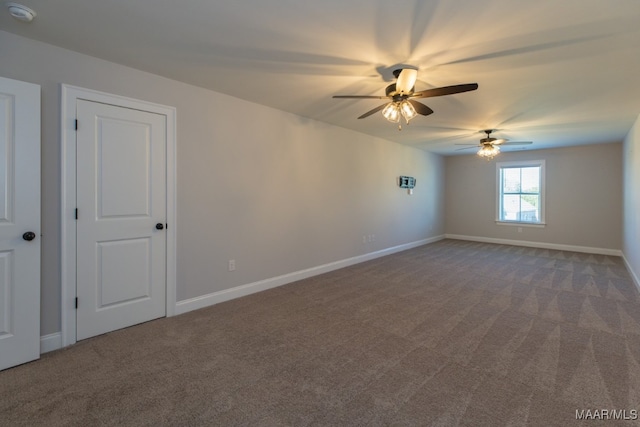 unfurnished room featuring carpet flooring and ceiling fan