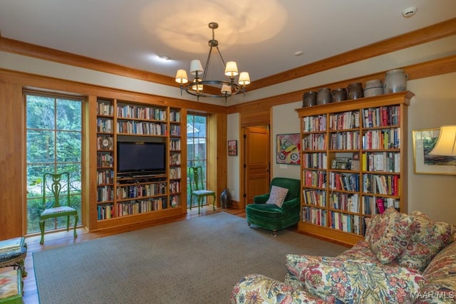 living area with an inviting chandelier