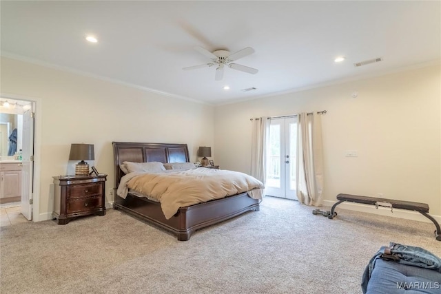 carpeted bedroom featuring access to outside, ensuite bath, ceiling fan, and crown molding