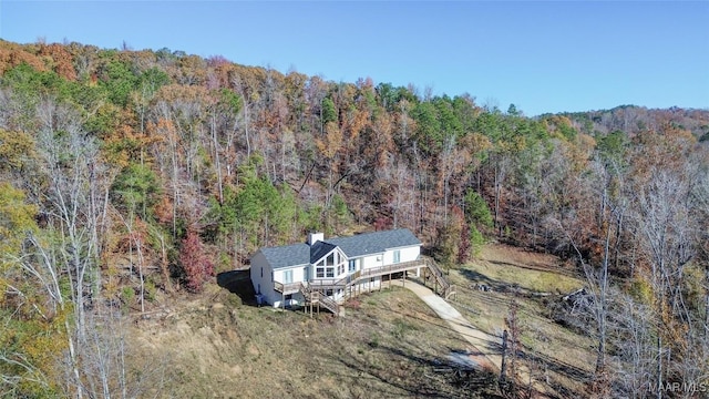 bird's eye view with a view of trees