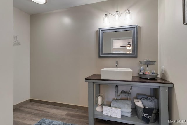 bathroom with vanity and wood-type flooring