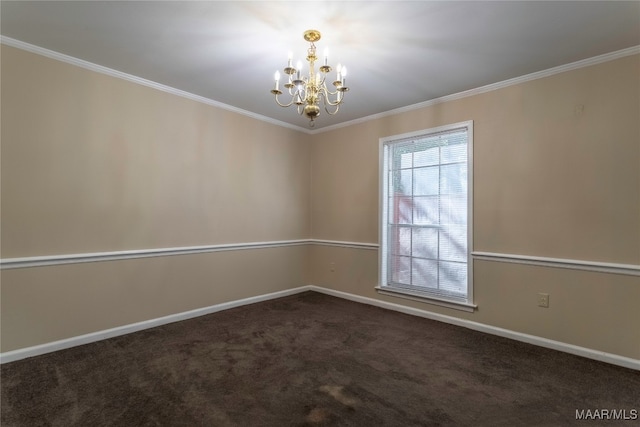 carpeted empty room featuring a notable chandelier and ornamental molding