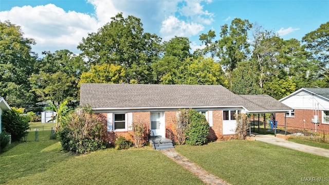 ranch-style home with a front lawn