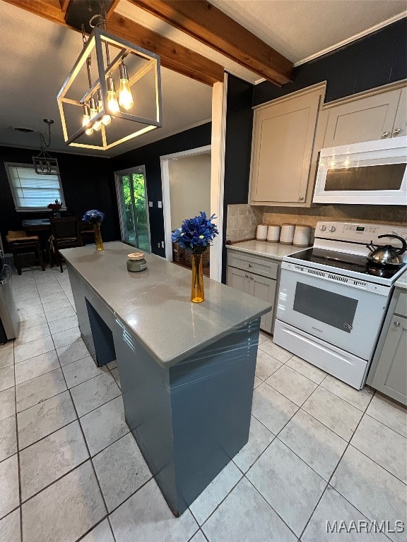 kitchen featuring hanging light fixtures, an inviting chandelier, beamed ceiling, white range oven, and a center island