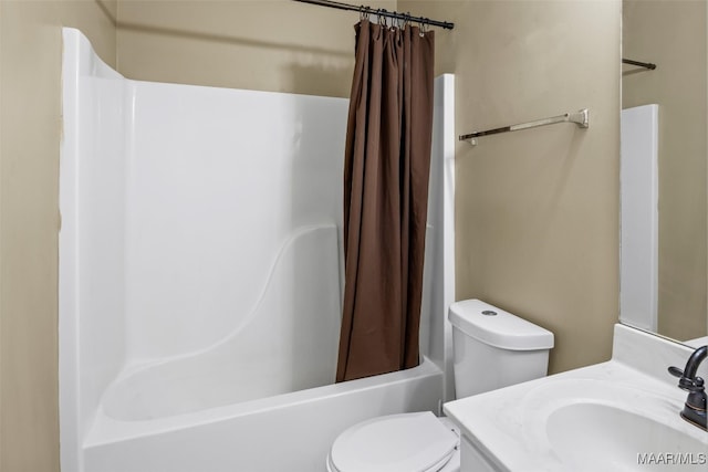 full bathroom with vanity, toilet, and shower / tub combo