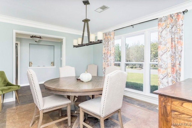 dining area with ornamental molding, a chandelier, and concrete floors