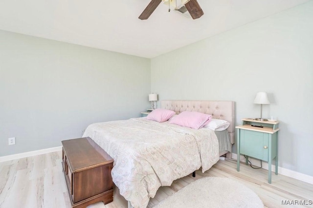 bedroom featuring light hardwood / wood-style floors and ceiling fan