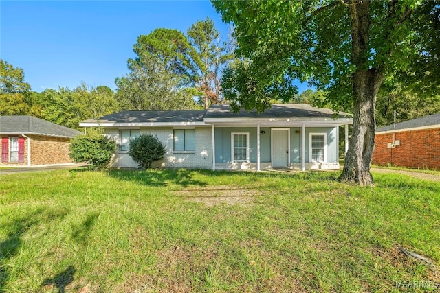 back of house with a yard