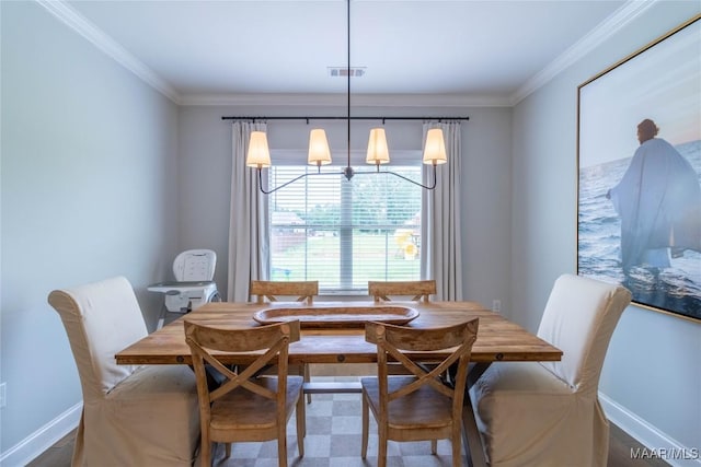 dining area with crown molding