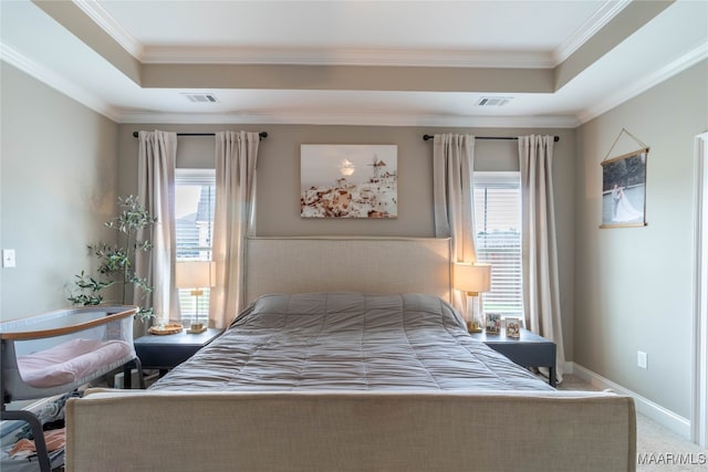 bedroom featuring ornamental molding and carpet