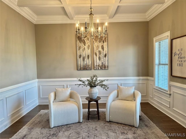 living area with crown molding, a chandelier, coffered ceiling, beam ceiling, and wood finished floors