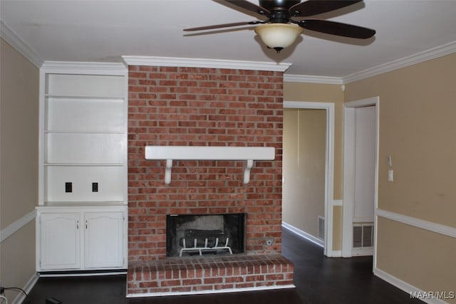 unfurnished living room with a fireplace, ceiling fan, dark wood-type flooring, and crown molding