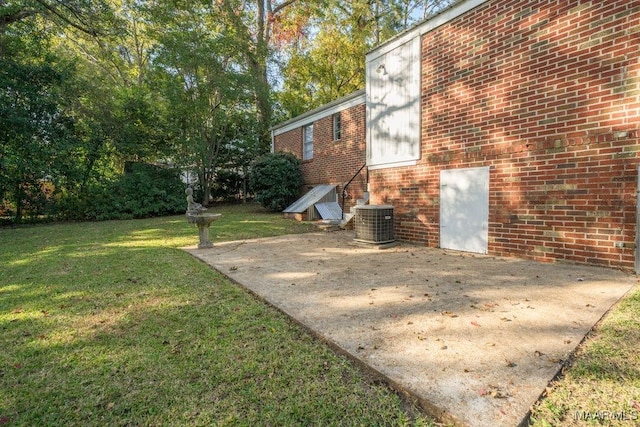 3712 Ware Ct, Montgomery, AL 36109 - view of yard with central air condition unit and a patio area