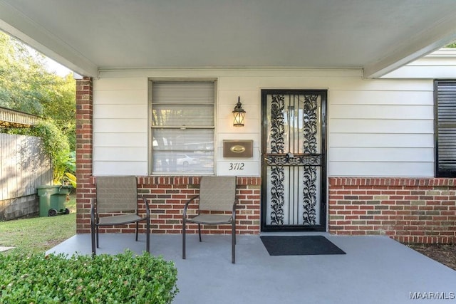 3712 Ware Ct, Montgomery, AL 36109 - entrance to property featuring a porch and brick siding