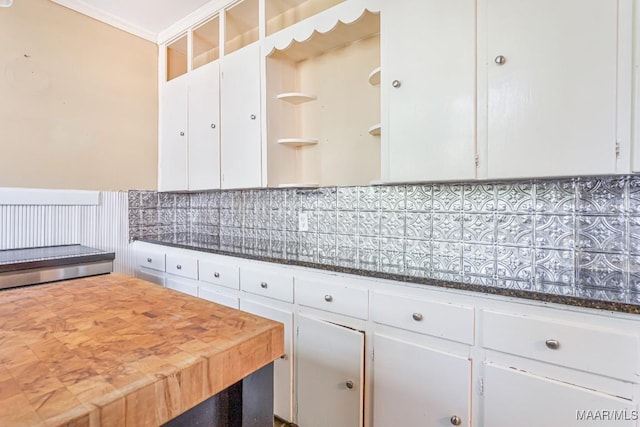 kitchen featuring ornamental molding, open shelves, backsplash, and white cabinetry