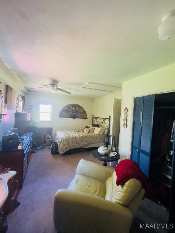 carpeted bedroom with ceiling fan