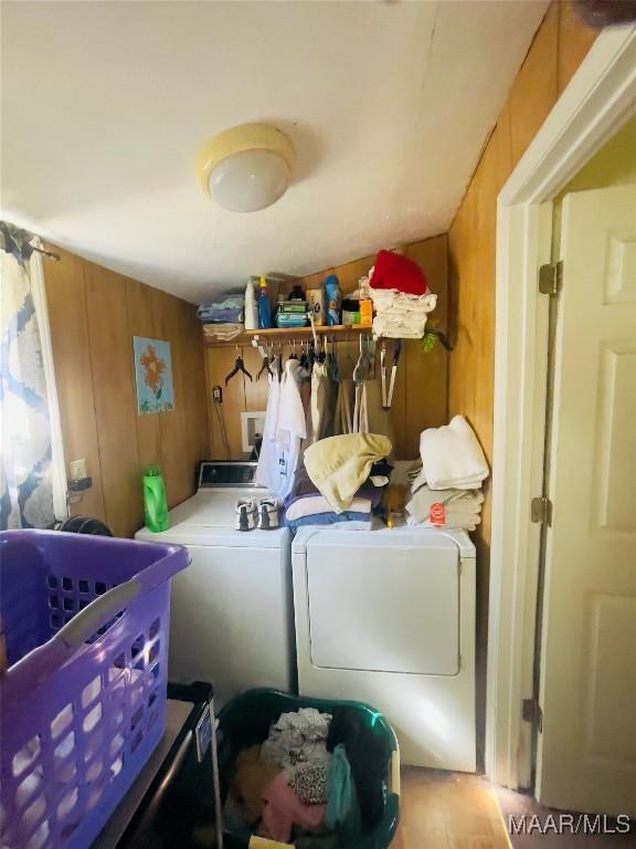 895 Lamar Rd, Hope Hull, AL 36043 - washroom with washer and dryer and wooden walls