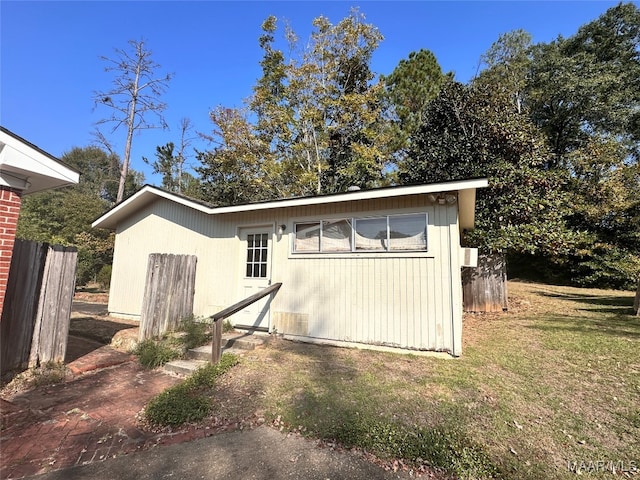 view of outdoor structure with a yard