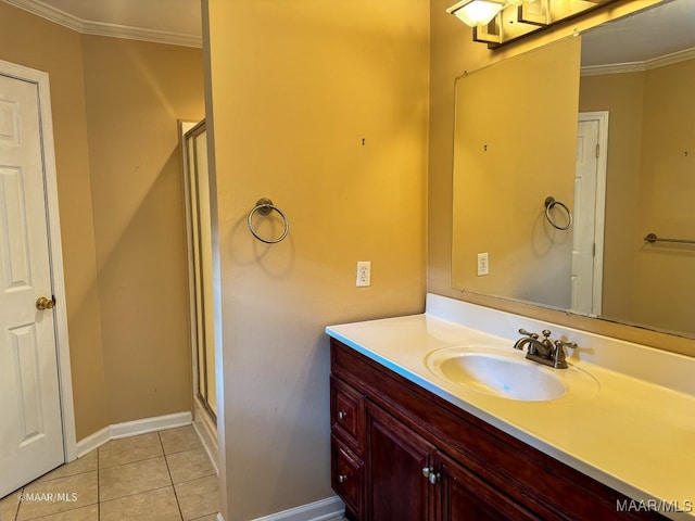 bathroom with crown molding, tile patterned flooring, and a shower with door