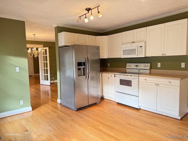 kitchen featuring stainless steel refrigerator with ice dispenser, a chandelier, range, light hardwood / wood-style floors, and white cabinetry