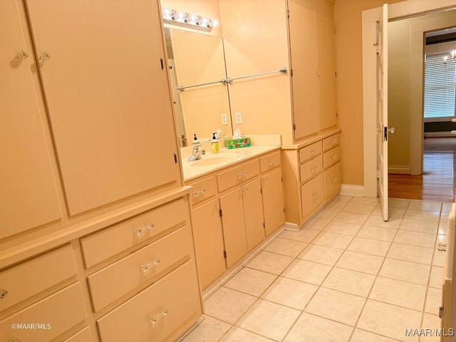 bathroom with vanity and tile patterned floors