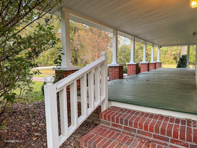 wooden deck featuring covered porch