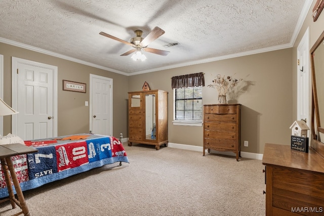 carpeted bedroom featuring ornamental molding, a textured ceiling, and ceiling fan