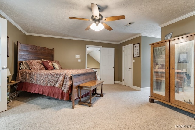 carpeted bedroom featuring ornamental molding, a textured ceiling, and ceiling fan