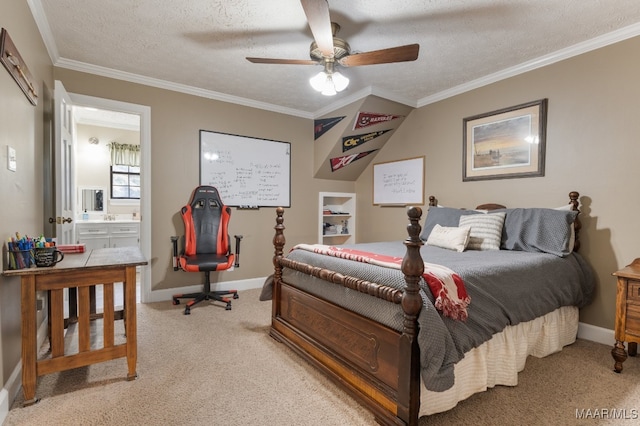 carpeted bedroom with connected bathroom, ornamental molding, a textured ceiling, and ceiling fan