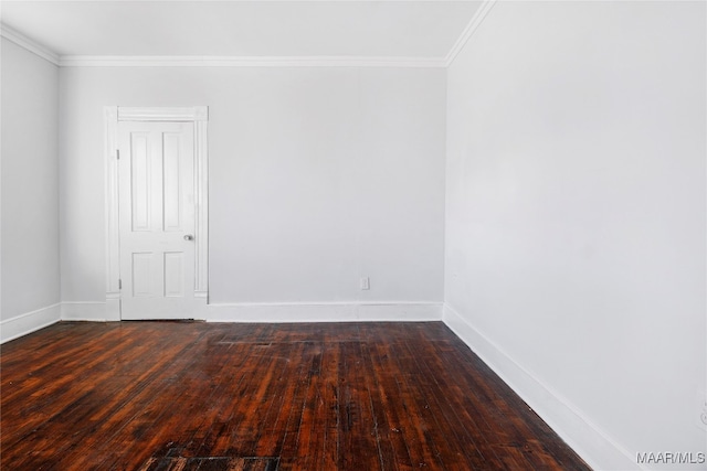 unfurnished room with crown molding and dark hardwood / wood-style flooring