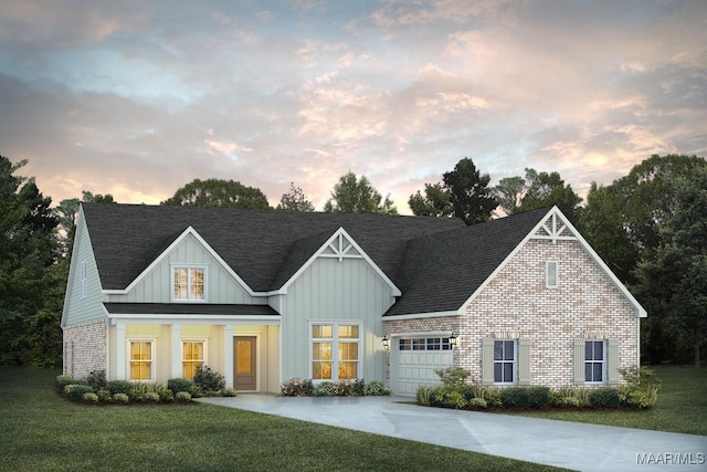 view of front of home with a lawn