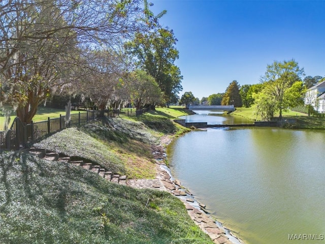 water view featuring fence