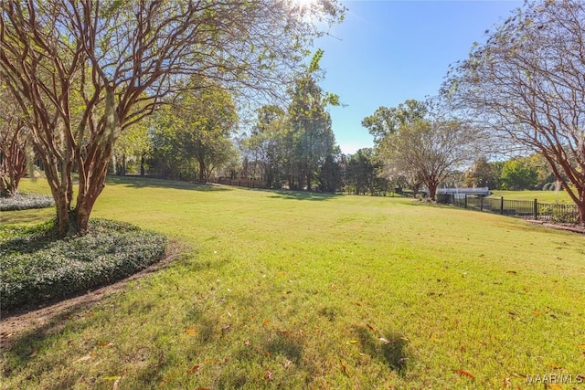 view of yard with fence