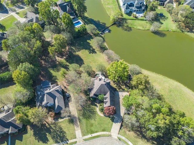 bird's eye view featuring a water view and a residential view