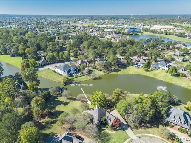 bird's eye view with a water view and a residential view