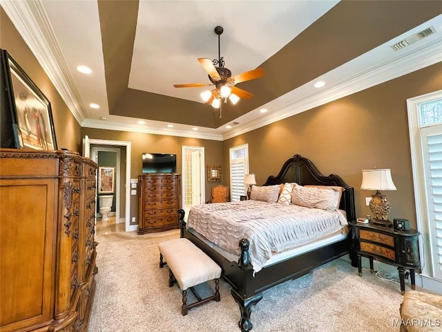 bedroom featuring crown molding, recessed lighting, a raised ceiling, visible vents, and light carpet