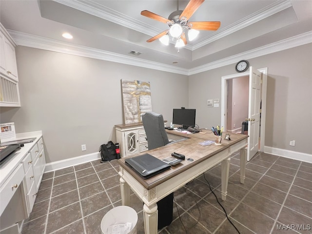 office area featuring dark tile patterned flooring, a raised ceiling, visible vents, and baseboards