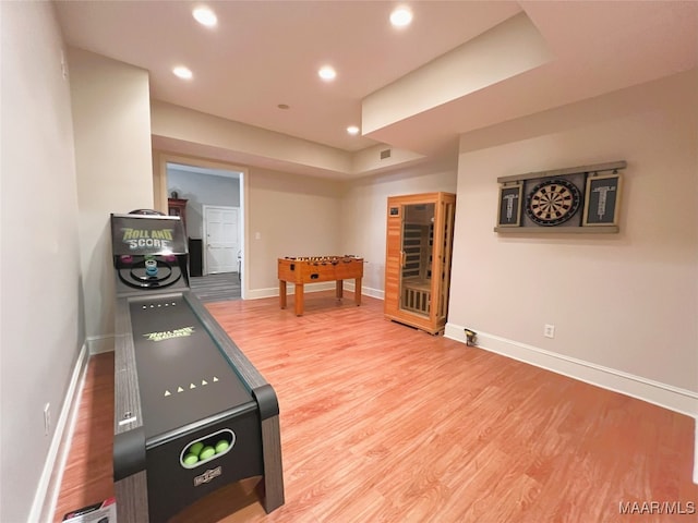 recreation room featuring hardwood / wood-style flooring