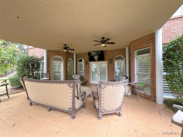 view of patio / terrace featuring french doors and ceiling fan