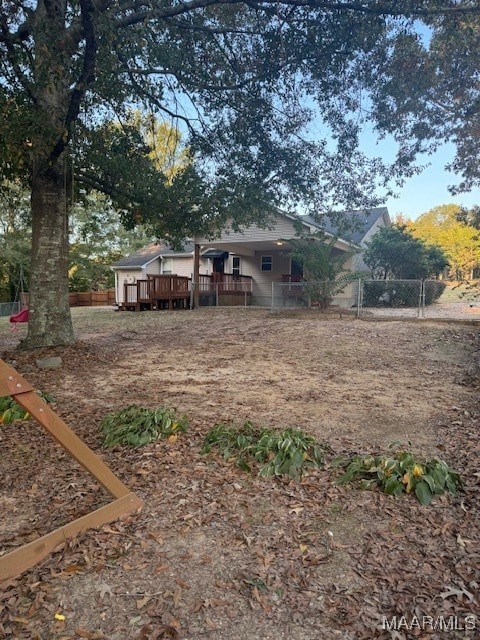 view of yard with a deck