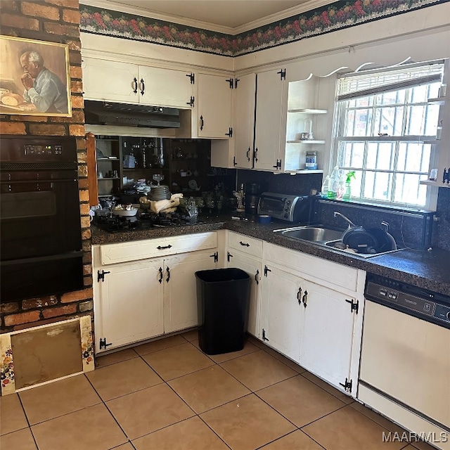 kitchen with sink, white dishwasher, white cabinetry, black oven, and crown molding