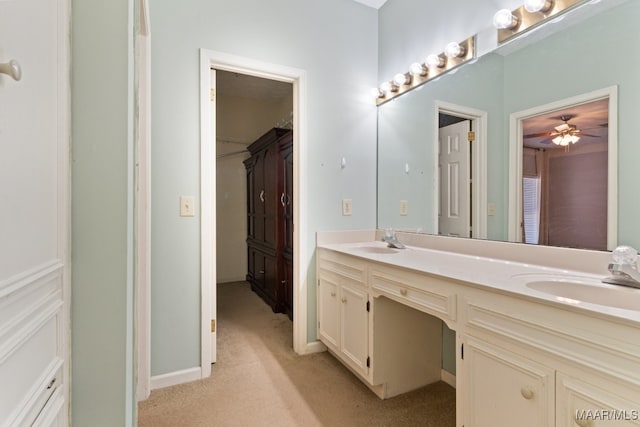 bathroom featuring vanity and ceiling fan