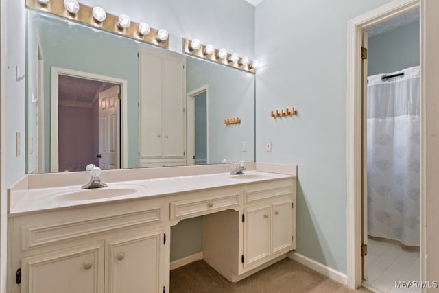 bathroom featuring vanity and walk in shower