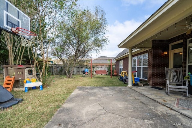 5612 New Harvest Dr, Montgomery, AL 36116 - view of yard featuring a playground and a patio area