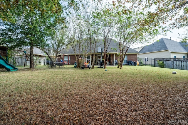 view of yard featuring a playground