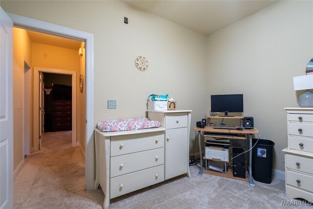 office space with light colored carpet