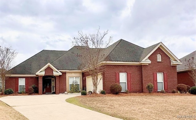 5612 New Harvest Dr, Montgomery, AL 36116 - view of front of home featuring driveway, an attached garage, roof with shingles, and brick siding