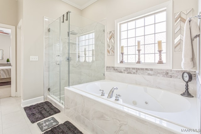 bathroom with crown molding, independent shower and bath, and tile patterned flooring