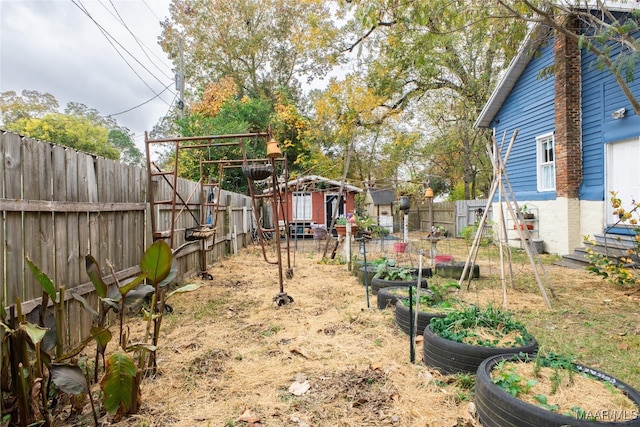 view of yard with a storage shed