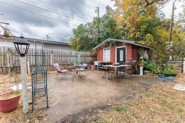 view of patio / terrace featuring an outdoor structure